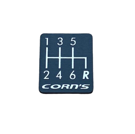 Manual Shift 6 Speed Domed Chrome Emblem Decal – Black Background – 2" X 2.25" – Glossy